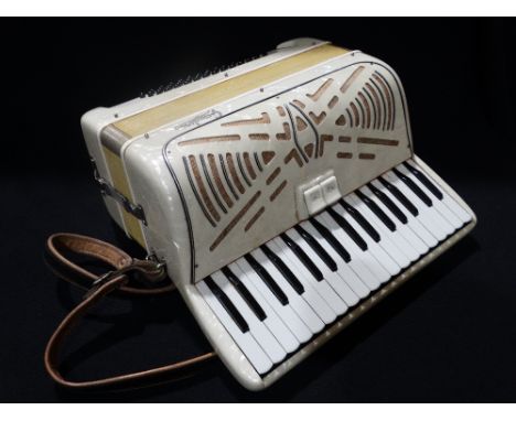     A Cased Gaudini Pearl Lustre Finish Accordion                                   