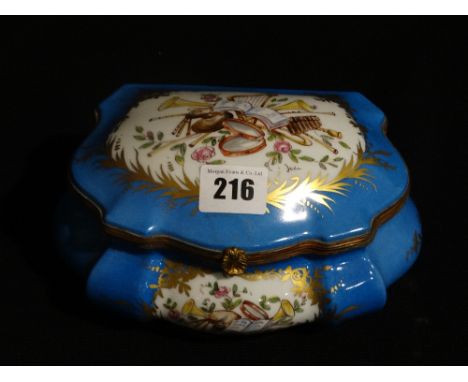     A Sevres Porcelain Lidded Casket With Panel Of Musical Instruments To The Lid   