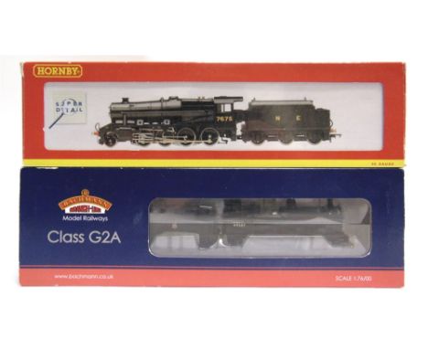 [OO GAUGE]. TWO LOCOMOTIVES  comprising a Bachmann No.31-478, B.R. Class G2A 0-8-0 tender locomotive, 49287, black livery, bo