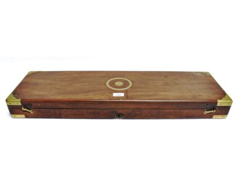 A 19TH CENTURY BRASS-BOUND MAHOGANY GUN OR AMMUNITION CASE with a felt-lined, fitted interior, the hinged lid bearing a circu
