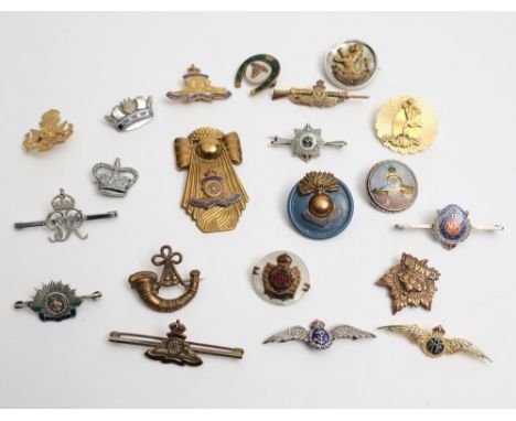 A silver and enamel RAF sweet heart brooch, together with a small collection of Army and RAF brooches and badges etc:.
