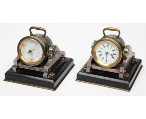 A late 19th /early 20th century silver plated clock and barometer desk set in the form of mortars:, both with white enamel di