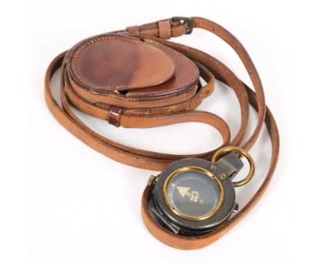 A WWI period officers trench compass: with War Office arrow, the stitched leather case stamped Martins-Birmingham Limd, 797.