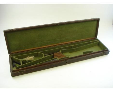 An oak gun case:, with folding brass bail handle to top, fitted interior with green baize, also together with cleaning rod se