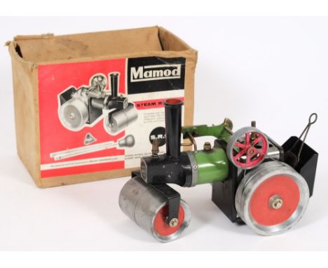 A Mamod live steam roller: with green and red coachwork, boxed.

