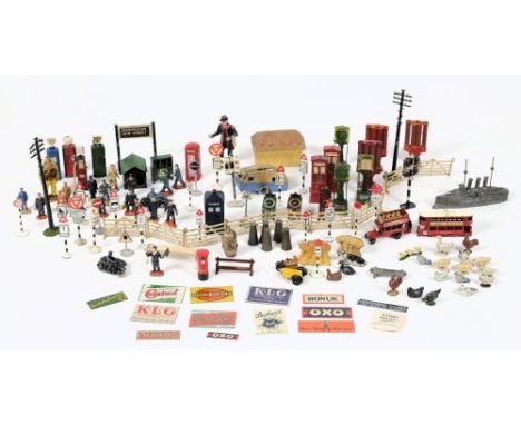 Hornby, Meccano and others, a quantity of trackside figures, and accessories: including platform chocolate machines, weighing