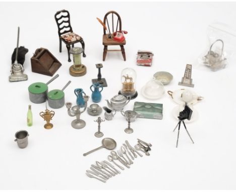 A collection of various early 20th century dolls house furniture and fittings:, including a candelabra, teapot, mantel clock 