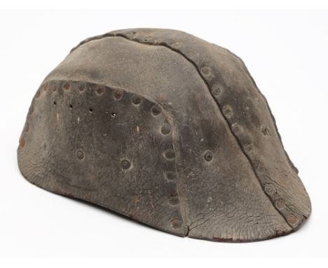 A rare model 1916 British Tank crew helmet:, the leather helmet constructed from four sections riveted together, four air hol
