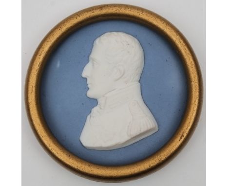 Duke of Wellington - a circular ceramic bisque medallion:, with white profile and uniformed bust to left, set on a blue washe