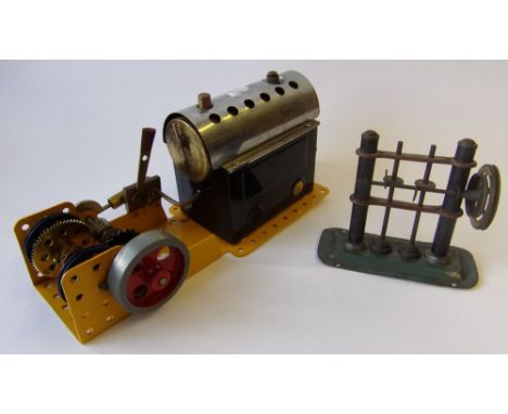 A Meccano horizontal live steam plant, on a baseplate: together with a German tinplate power hammer.
