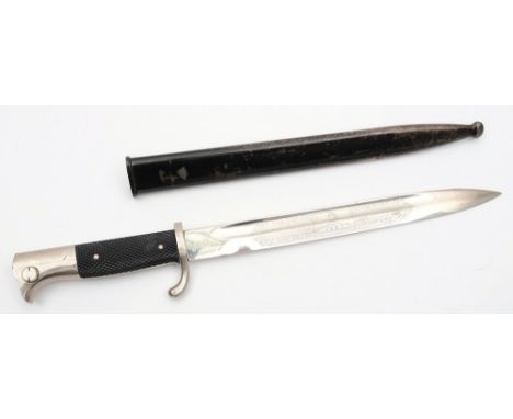 A German dress bayonet by WKC:, the single edged fullered blade with acid etched decoration, signed to ricasso as per title, 