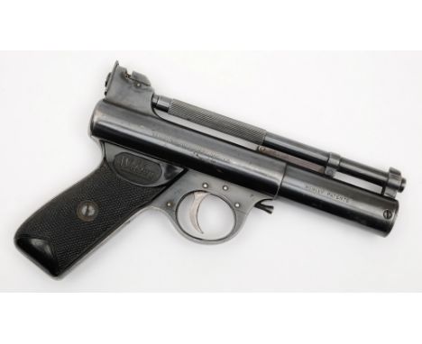 A Webley Mark I air pistol:, in .177 calibre, post war model with knurled over lever barrel and black chequered plastic grips