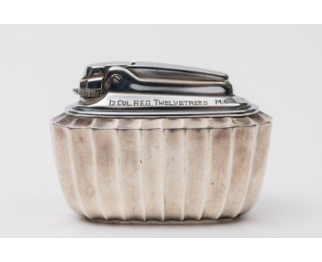 A Ronson plated presentation table lighter: with regimental inscription.