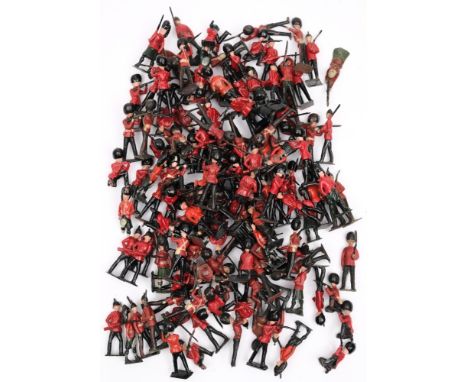 A  collection of Britains Guardsmen, Highlanders and Light Infantry figures:.