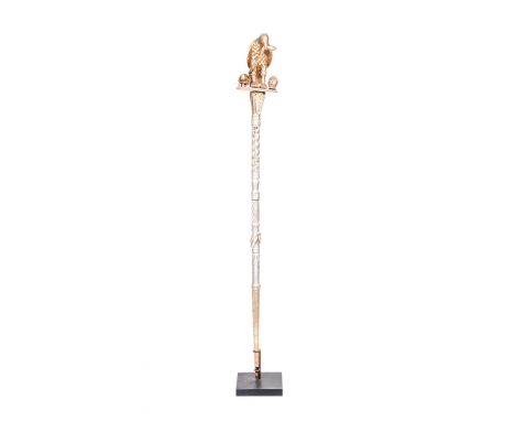 GHANAIAN LINGUIST STAFF height: 186cm the finial carved as a raptor with a snake in its beak 