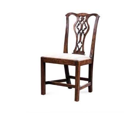 A WALNUT 'CHIPPENDALE STYLE' SIDE CHAIR, 19TH CENTURY the curved top rail above a carved and pierced splat, drop-in seat, on 