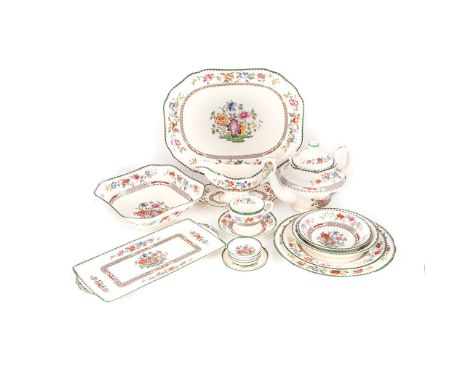 A COPELAND SPODE 'CHINESE ROSE' PATTERN PART DINNER AND TEA SERVICE, 1952 - 2006 each with floral design against a crème grou