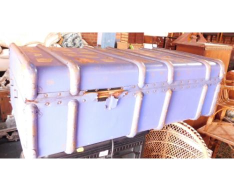 A blue painted brass bound travel trunk. 