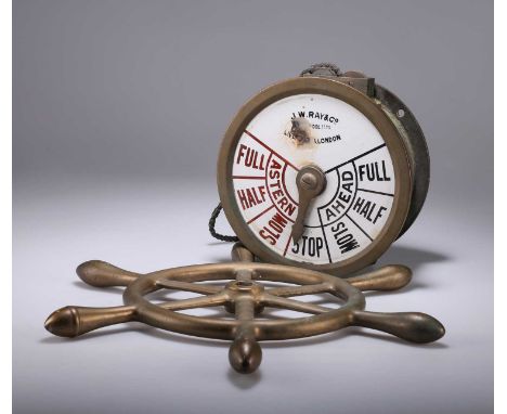 A BRASS-CASED SHIPS ENGINE ORDER TELEGRAPH AND AN ENGINE ROOM VALVE WHEEL the order telegraph signed J.W. RAY &amp; CO (LIVER