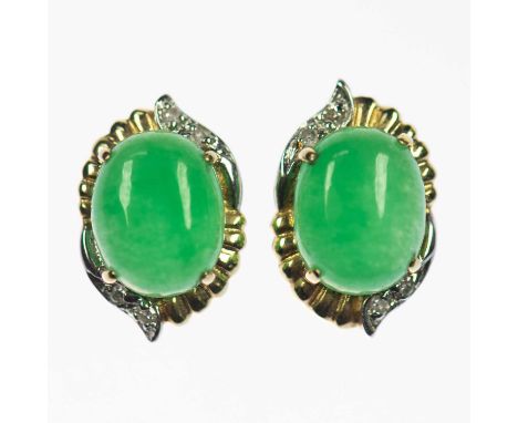 A PAIR OF BI-COLOUR JADE AND DIAMOND EARRINGS oval jade within bi-colour fancy frames with diamond accents, with post fitting