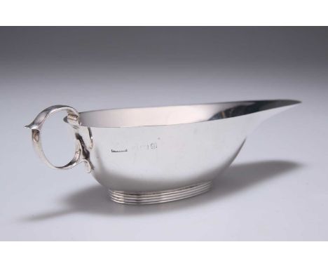 AN EDWARD VIII SILVER PAP BOAT by S Blanckensee &amp; Son Ltd, Birmingham 1936, with ring handle, raised on a reeded oval foo