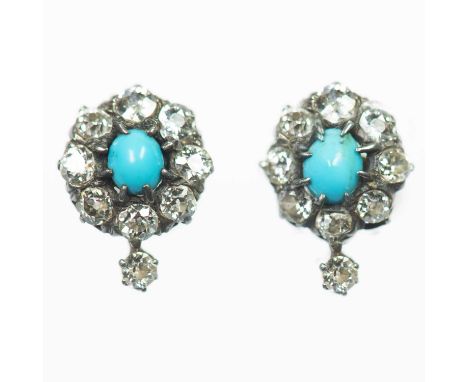 A PAIR OF DIAMOND AND TURQUOISE CLUSTER EARRINGS oval turquoise within borders of old-cut diamonds, with post fittings. Estim