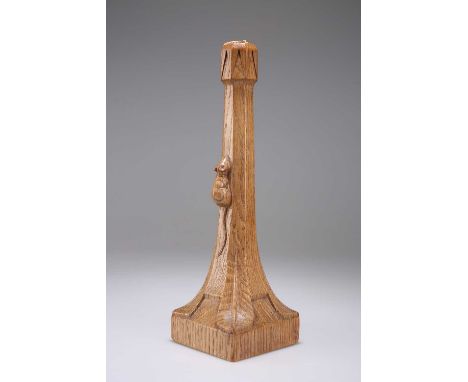 ROBERT THOMPSON OF KILBURN, A MOUSEMAN OAK TABLE LAMP the octagonal stem issuing from a square base, adzed, with carved mouse