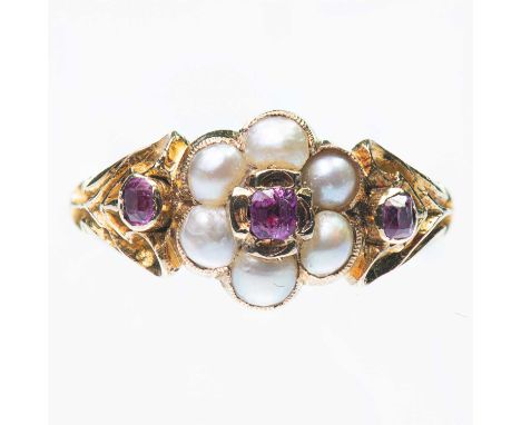 A VICTORIAN SPLIT PEARL AND GARNET CLUSTER RING a cushion-cut garnet within a border of split pearls to garnet-set fancy scro
