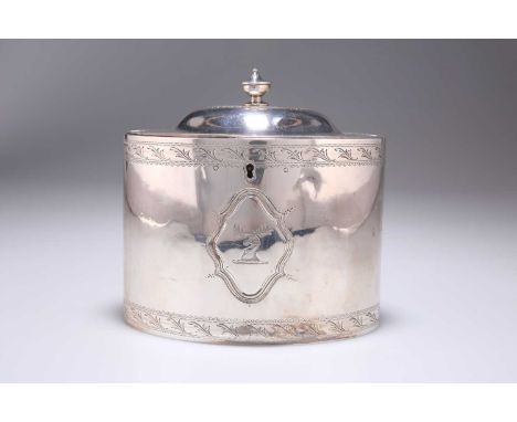 A GEORGE III SILVER TEA CADDY maker JS (Grimwade 3687), London 1791, oval, the hinged domed cover with urn-form finial, engra