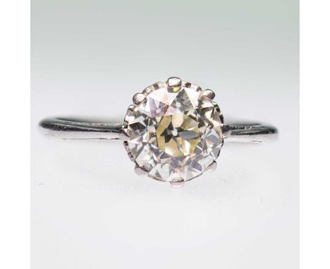 A SOLITAIRE DIAMOND RING an old-cut diamond in a claw setting, to knife-edge shoulders. Estimated diamond weight 1.65ct, mark