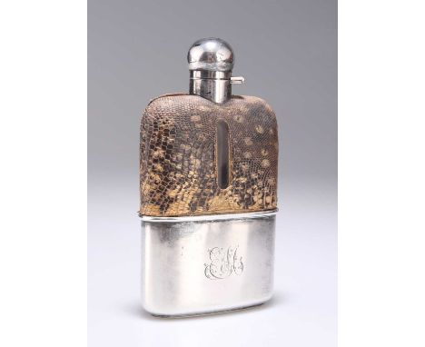 A VICTORIAN SILVER AND SNAKESKIN SPIRIT FLASK by Sampson Mordan &amp; Co, London 1896, the glass body with a hinged bayonet c