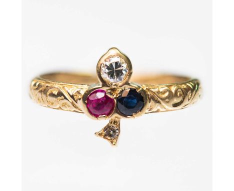 AN ANTIQUE STYLE 18 CARAT GOLD RUBY, DIAMOND AND SAPPHIRE CLOVER RING a round-cut ruby, diamond and sapphire set in a clover 