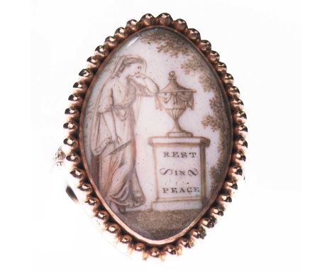 A GEORGIAN MOURNING RING  the marquise bezel sepia painted depicting a female mourner by an urn and inscribed 'Rest in Peace'