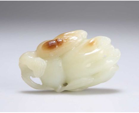 A CHINESE CARVED JADE GROUP depicting a finger citron and beetle. 6.5cm long
