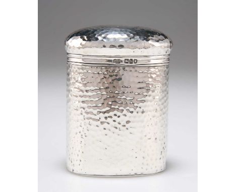 AN EDWARDIAN SILVER TABLE JAR AND COVER by Finnigans Ltd, London 1903, oval, planished all over, with vacant roundel cartouch