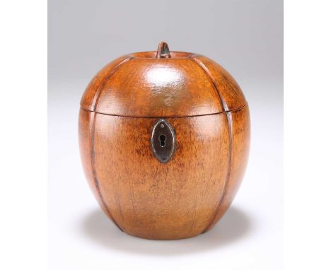 A GEORGE III FRUITWOOD TEA CADDY, IN THE FORM OF A MELON  the exterior with four equally spaced vertical chanels, the top wit