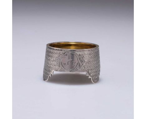 A RUSSIAN SILVER SALT circular, with engine-turned ground, engraved L v. F.F. to a cartouche, inscribed on the underside. 4.5