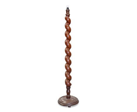 A VICTORIAN MAHOGANY STANDARD LAMP with a boldly turned barley twist column. 173cm high overall