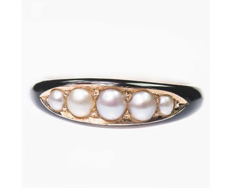 A VICTORIAN SPLIT PEARL AND ENAMEL MOURNING RING graduated split pearls within a tapering black enamel band, the band inscrib