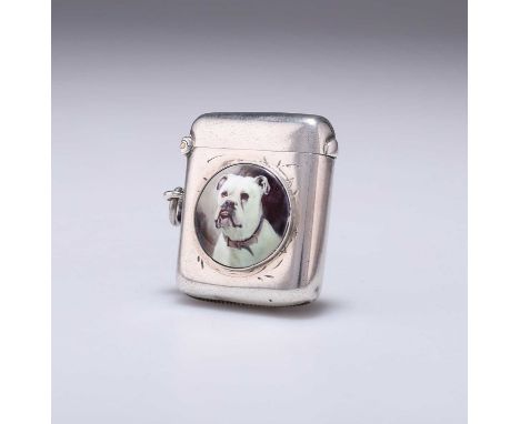 A LATE VICTORIAN SILVER AND ENAMEL VESTA CASE by William Neale, Chester 1900, rectangular, inset with an enamel depicting a b