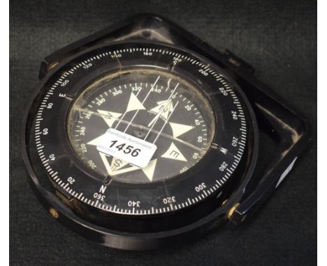 A Heath marine compass, black plastic, London England