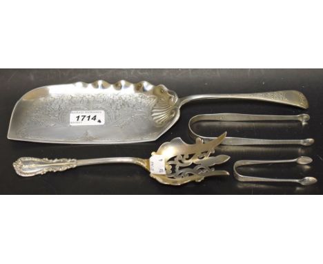 A silver crumb scoop, Birmingham 1894;  a sterling silver fish serving fork;  a pair of silver sugar tongs, London;  another 