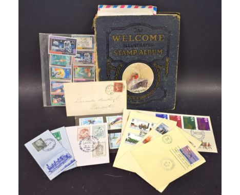 A stamp album, including First Day Covers, etc.