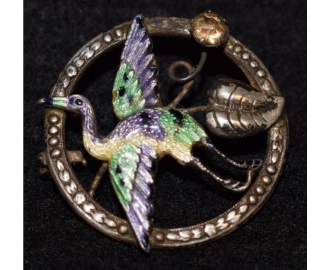 A Victorian silver and enamel stork brooch