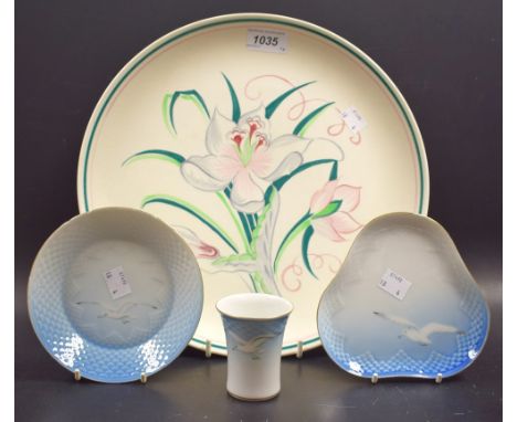 A Poole plate decorated with hand painted flowers;  a Royal Copenhagen seagull pattern dish;  others, miniature vase and bowl