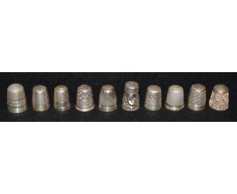 A silver thimble, Birmingham 1959; other thimbles, CH Dorcas; sterling silver, filigree; etc (10)