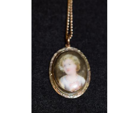 A Victorian portrait pendant, of a young girl