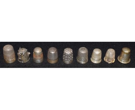 A silver thimble, Birmingham 1932, Royal Spa; other silver thimbles, Dorcas, sterling silver, 925; silver coloured metal thim