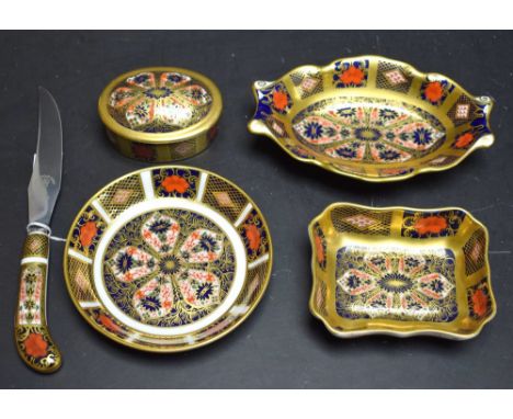 A Royal Crown Derby 1128 pattern Imari oval trinket pot and cover, an 1128 shaped oval pin tray, an 1128 butter knife, two si