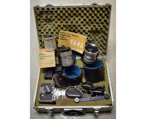 Photography - a Japanese Kowa  / Six camera outfit, comprising lens 228083, lens 160911 1:3.5, lens 150837 55mm, in a metal c